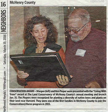 News article Margee and Ken Pieper receiving award form the Land Conservancy of McHenry County